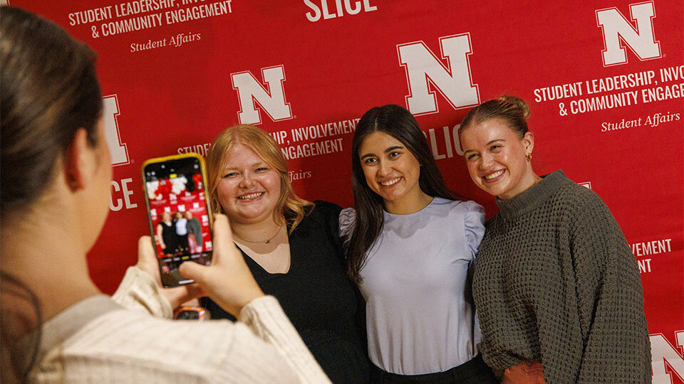 Three students pose for a photo at the 2024 Student Impact Awards. University of Nebraska-Lincoln. [photo by Mike Jackson]