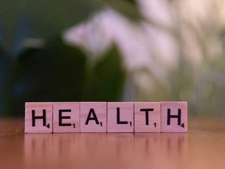 wooden letter tiles spelling the word Health