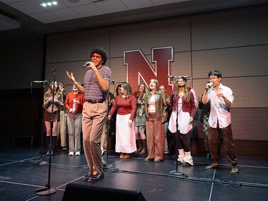 The Red Keys sings at Dinner and a Show in February 2026. Photo by Ana Wombacher.